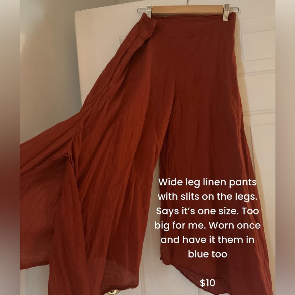 Wide leg linen pants with slit.